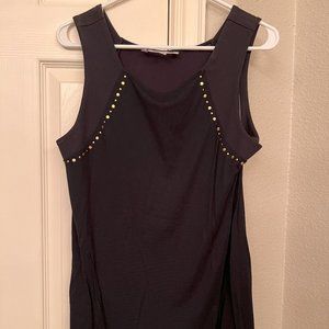 Jennifer Lopez L black tank top with gold studded detail